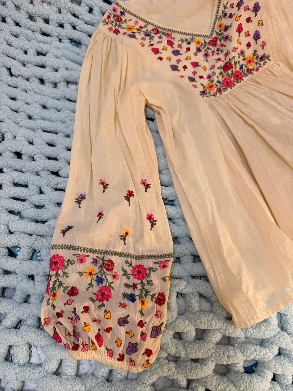Cream Embroidered Peasant Blouse with Colorful Floral Detail - Picture 16 of 17